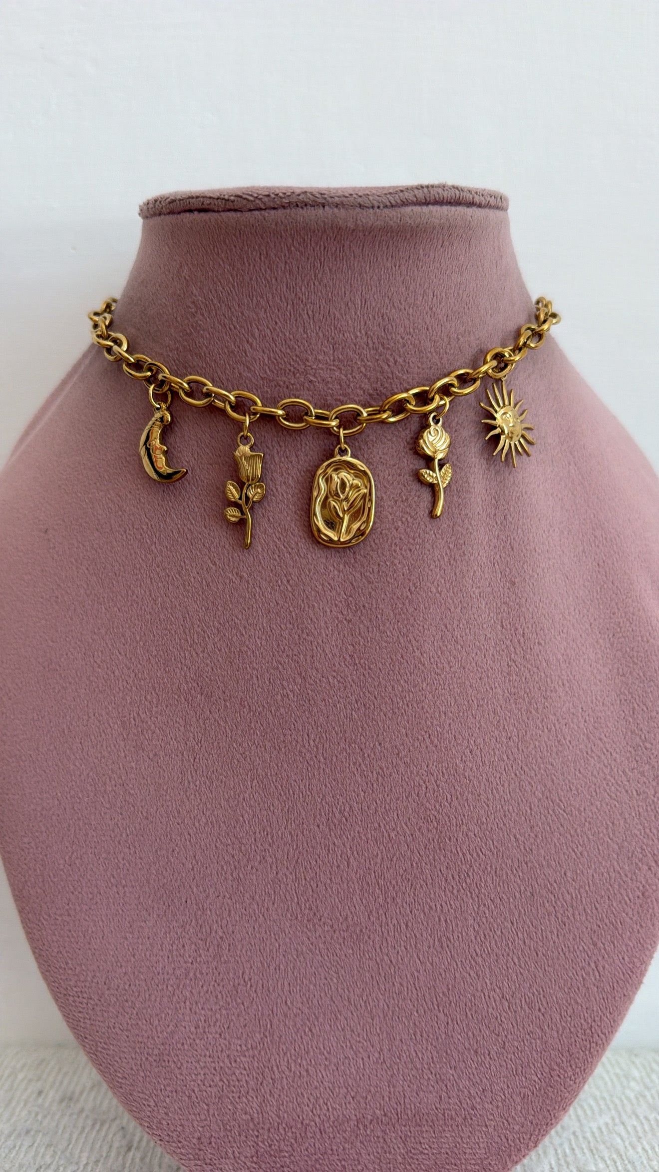 Collana multicharms floreale
