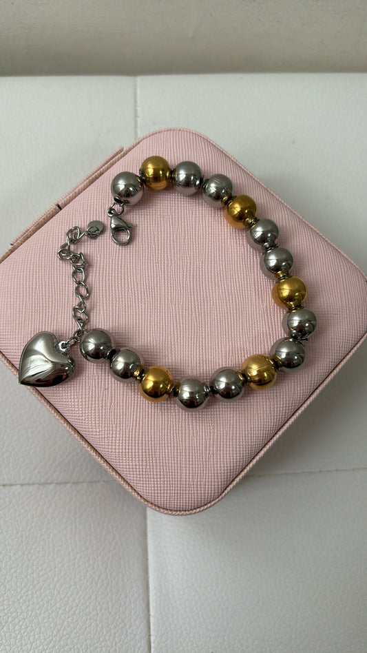 Bracciale multisfere e sonaglio bicolore con cuore