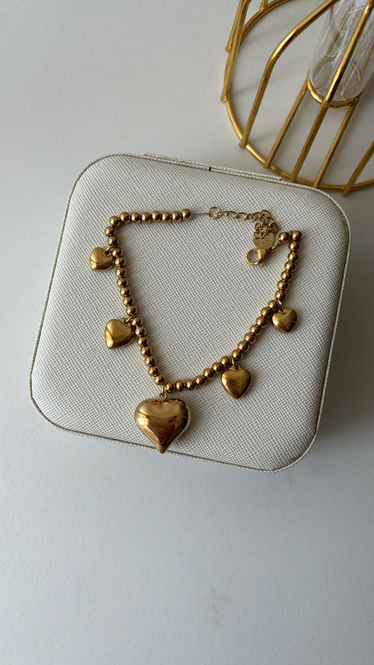 Bracciale cuori pendenti